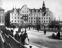 Västra Slussgatan 1904-05, kvarteret Achilles i bakgrunden