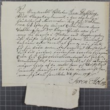 Ansökan om hjälp till änkan Wahlberg och hennes tre barn efter Norrmalmstorgsolyckan 1778
