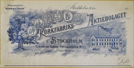 Fakturahuvud tryckt i mörkblått med bild på fabriksbyggnad, medaljer och korkek samt text.