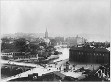 Utsikt  från Jakobs kyrka mot Helgeandsholmen under rivningen omkring 1890