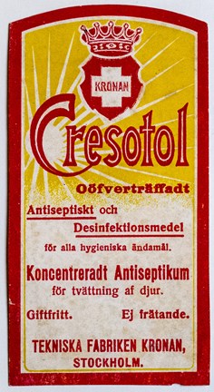 reklamkort tryckt i gult och rött med text
